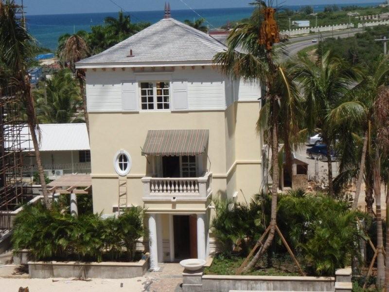 Villa with Tropical shingles & siding